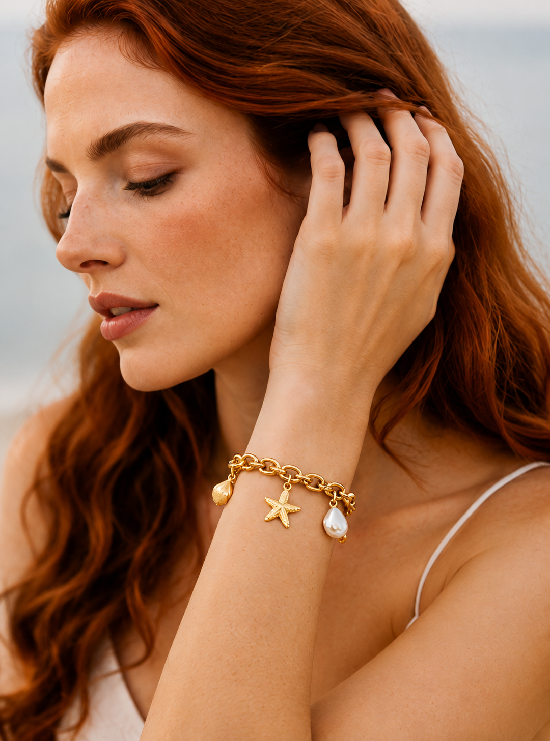 Gold Starfish Charm Bracelet